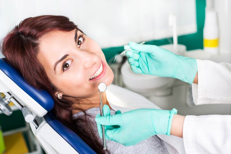 Smiling Woman At Dentist